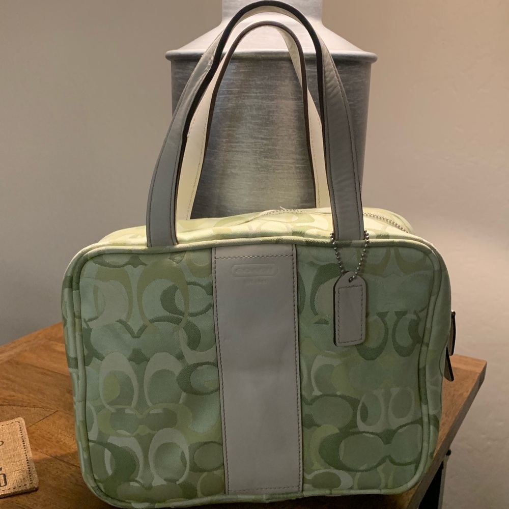 Coach cosmetic/toiletries bag.